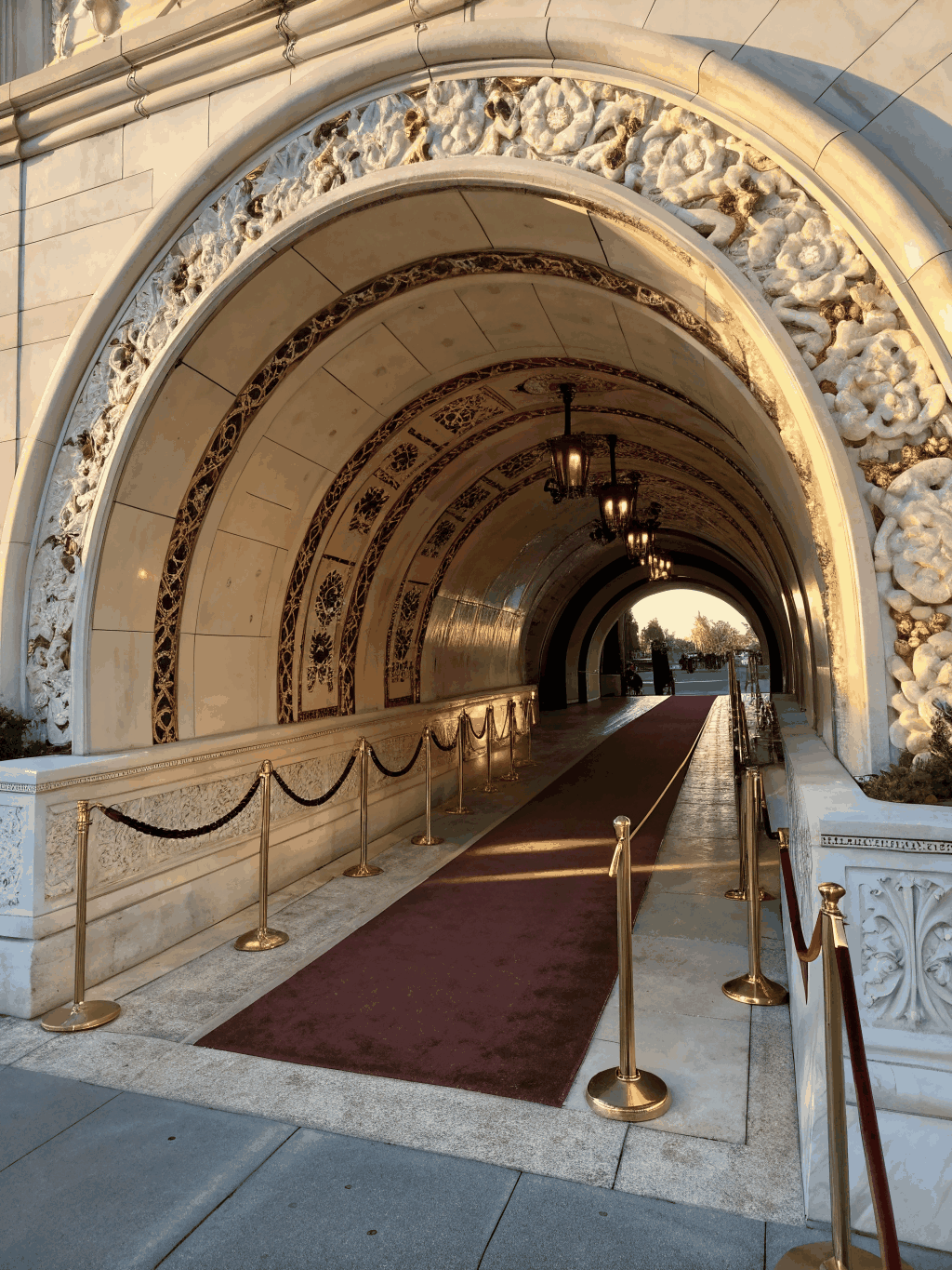 Elegant stone archway leading to the event venue space